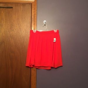 Bright orange skirt
